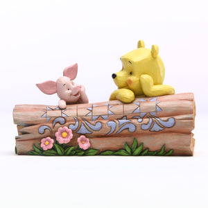 Enesco : Disney Traditions - Winnie The Pooh and Piglet by Log - Sheldonet Toy Store