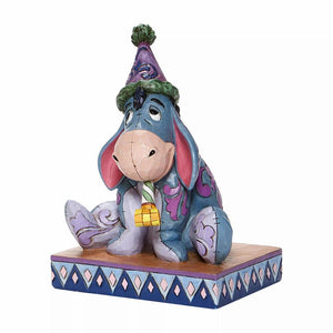 Enesco: Disney Traditions: Eeyore with Birthday Hat/Horn - Sheldonet Toy Store